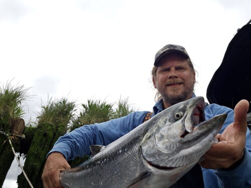 Your fishing guide Jerad Sorber with a beautiful freshly caught Spring Chinook