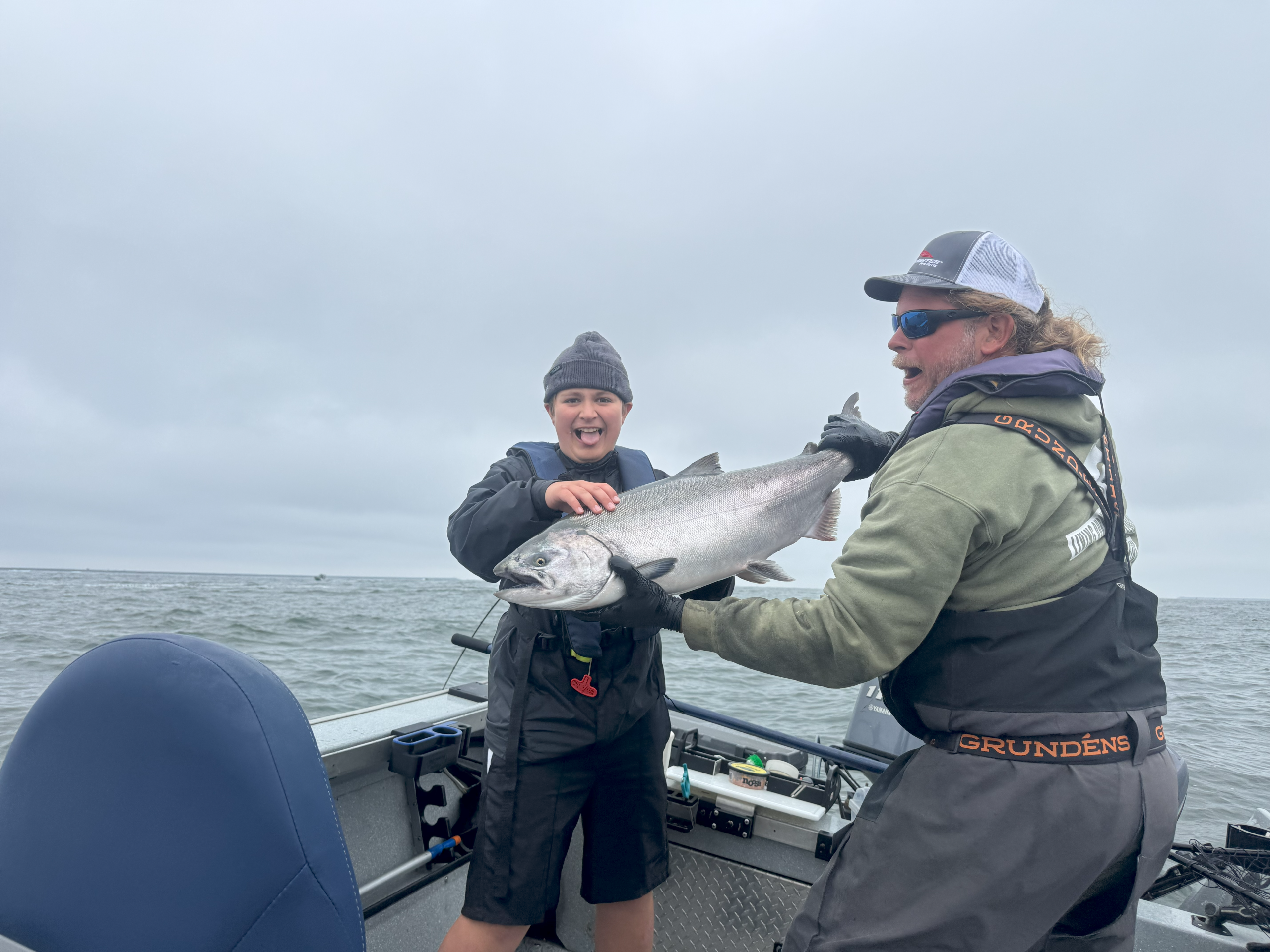 Levi showing off his first Columbia River Salmon during Buoy 10