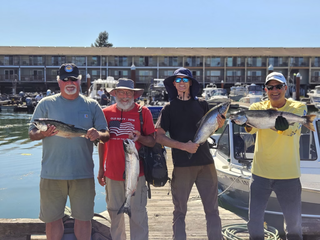 Chinook for everyone after a Buoy 10 Fishing Charter