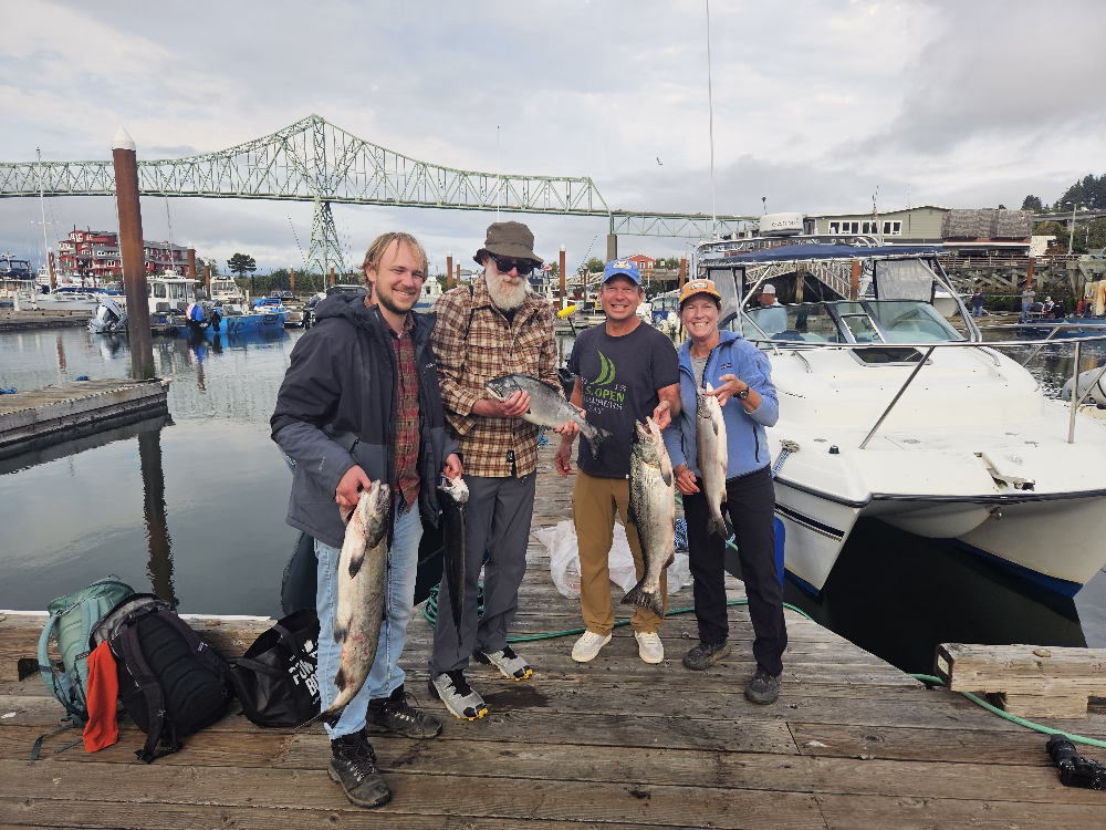 Another happy crew showing off their catch on a "Slow day" during Buoy 10 Salmon Fishing in Astoria, Oregon