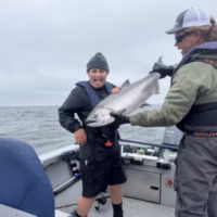 Levi showing off his first Columbia River Salmon during a Buoy 10 salmon fishing charter his dad took him on for his birthday!